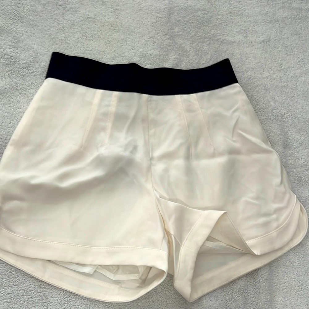 Bebe Contoured Hem Panel Shorts. Size-XS. New with Tags.